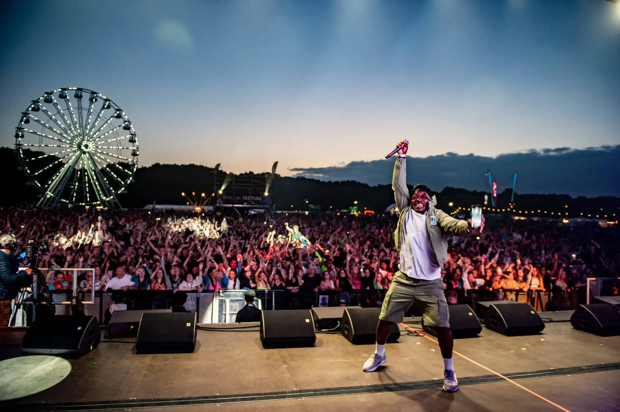 Artist on stage performing at festival